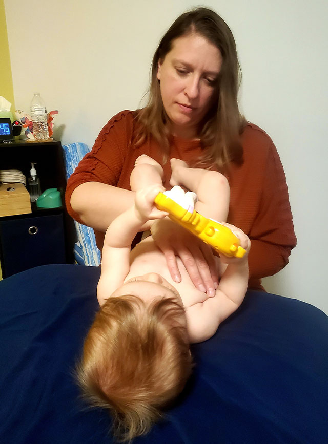 Myofascial Therapist in Janvesville performing on an infant