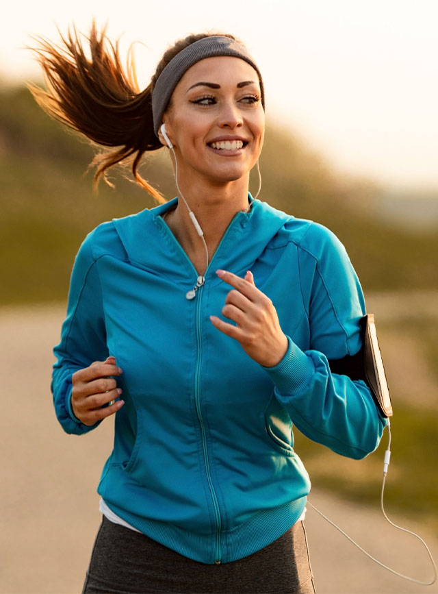 woman running after Myofascial Treatment